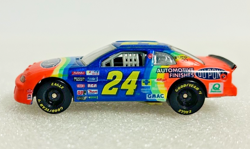 1997 Racing Champions Jeff Gordon #24 DuPont NASCAR Diecast Car + Card Stand
