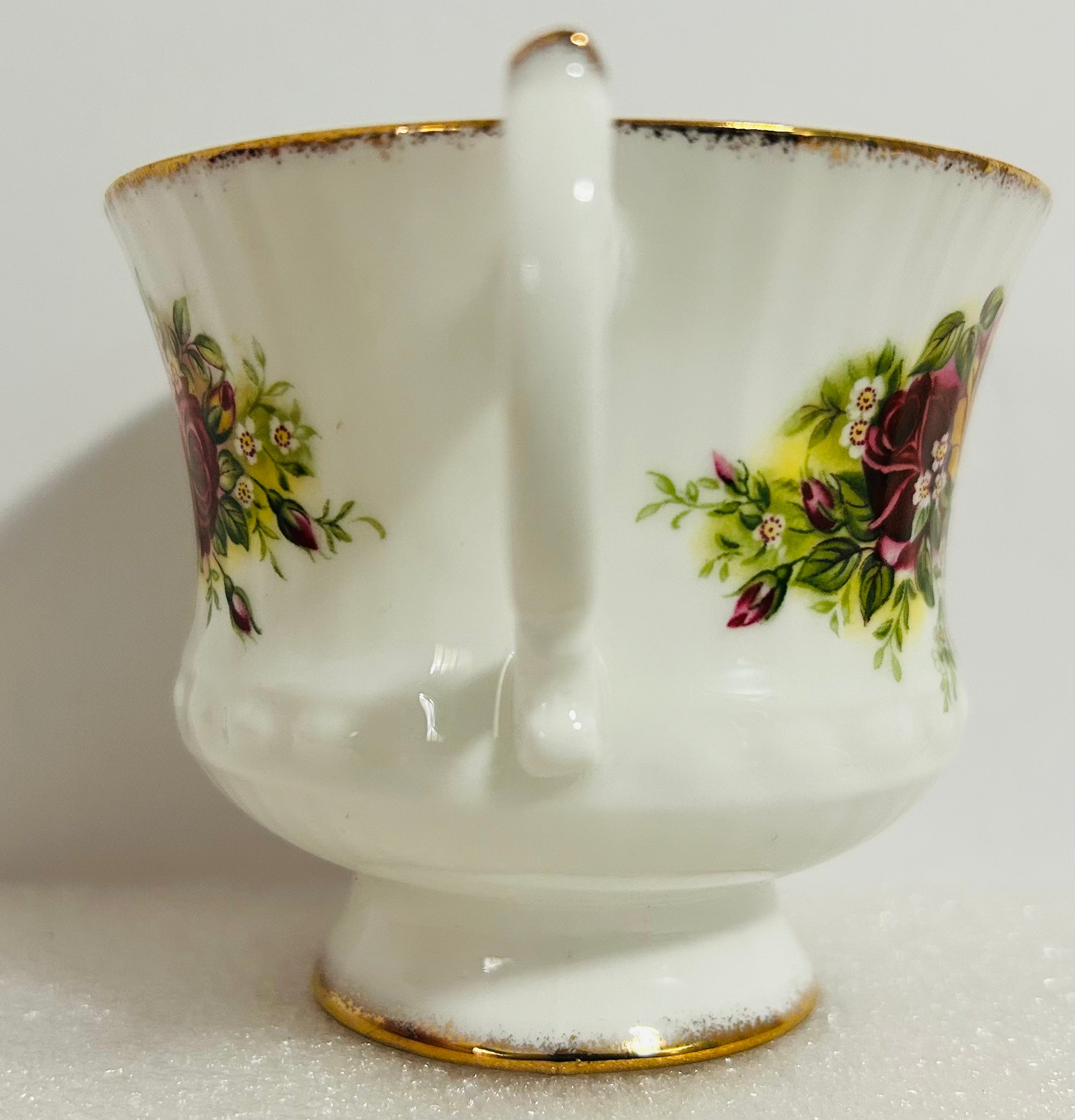 Elizabethan English Garden Teacup Saucer Bone China Roses Gold