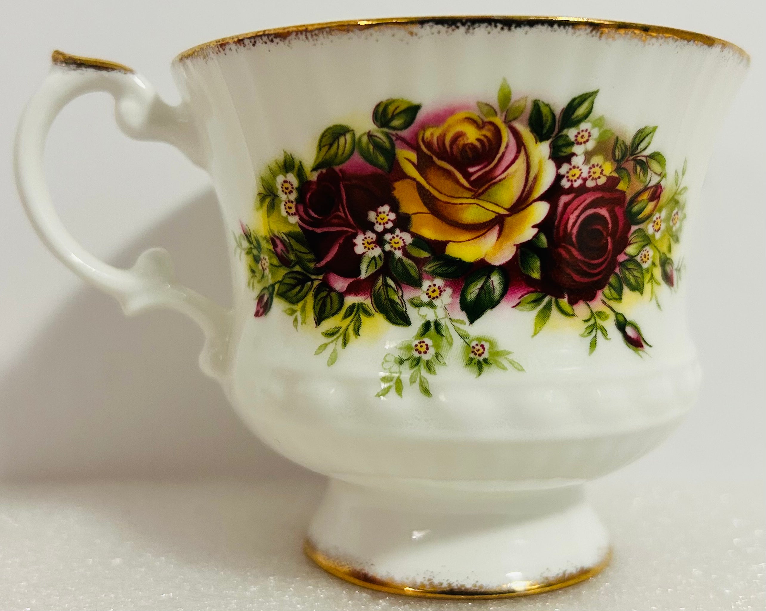 Elizabethan English Garden Teacup Saucer Bone China Roses Gold