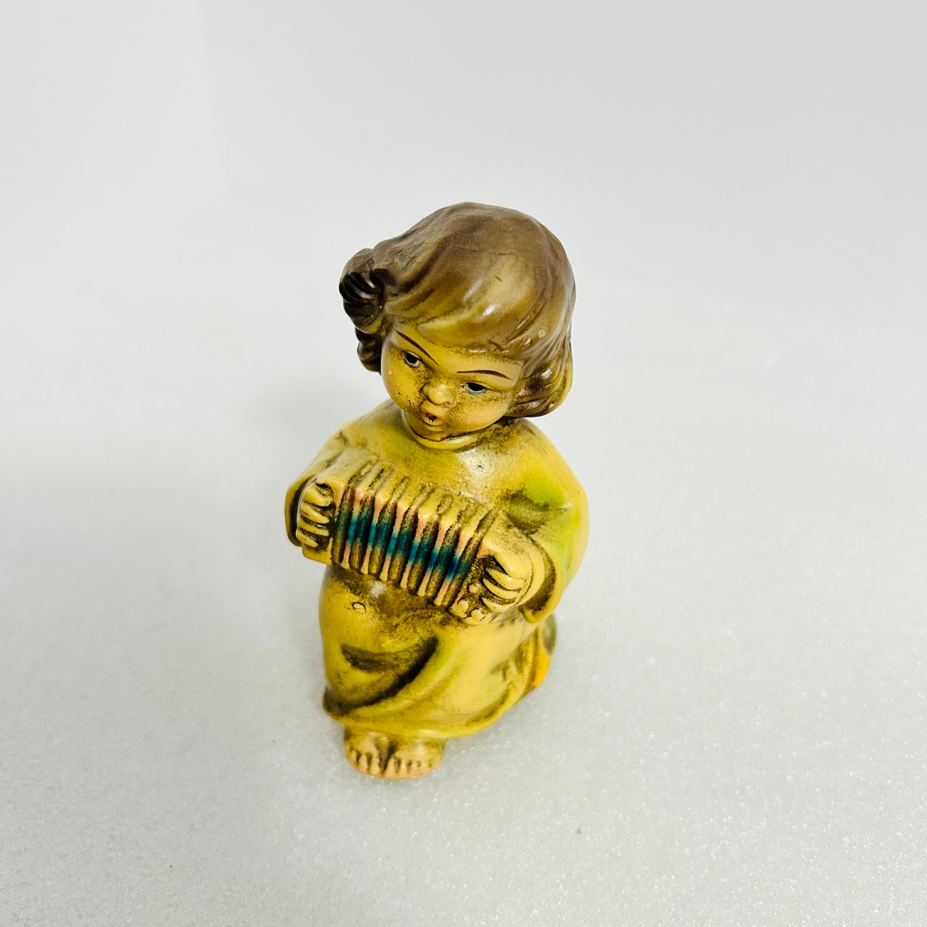 Vintage Chalkware Angel Figurine Accordion 4” Yellow Gold MCM
